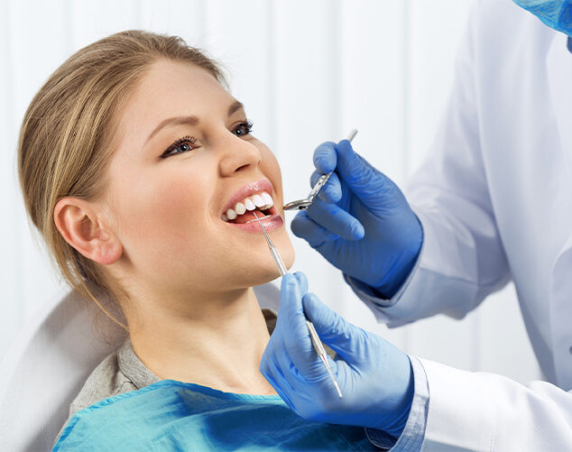 patient getting treatment at dental clinic